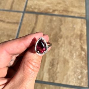 4.22 ct pear shaped rubellite (pink tourmaline) and 0.177 cute G-H/S/1 diamonds